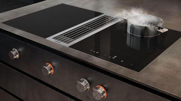 Gaggenau 400 series flex induction cooktop with downdraft ventilation