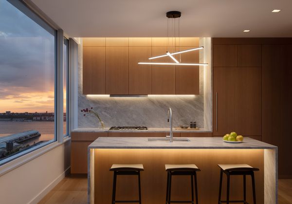 Evening in a kitchen in a luxury Manhattan apartment with Gaggenau appliances 