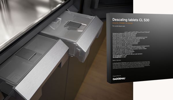 An image of the Gaggenau Combo-steam oven water drawers and a packet of descaling tablets