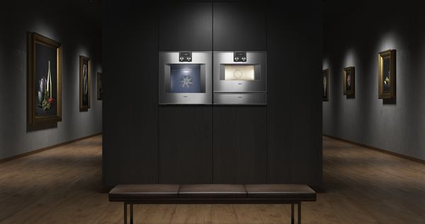 An image of a combination of Gaggenau ovens in the setting of an art gallery