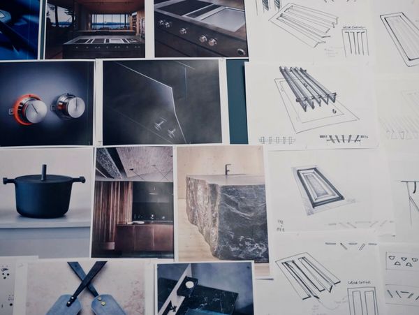 Various schematics, sketches, and photographs of Gaggenau appliances pinned to a designer's board.