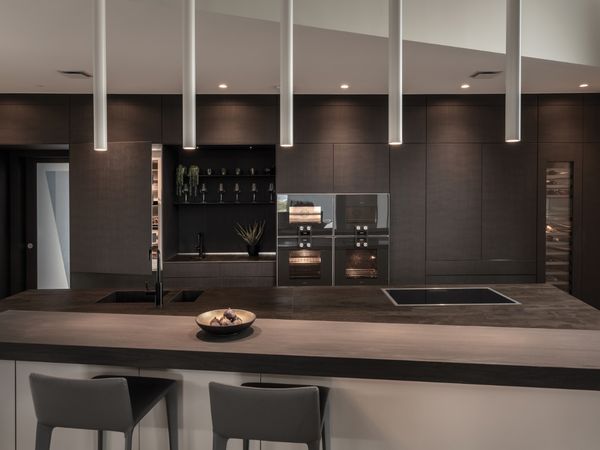 A modern luxury kitchen showing Gaggenau appliances