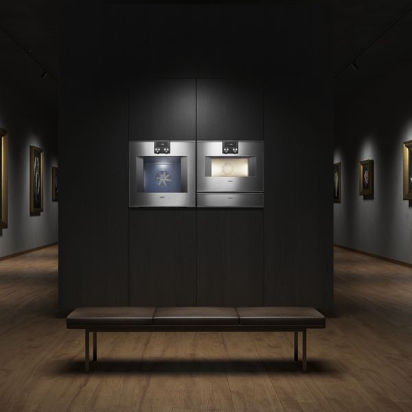 An image of a combination of Gaggenau ovens  in the setting of an art gallery