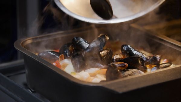 Close-up of Bouillabaisse being made in a Gaggenau Gastronorm roaster