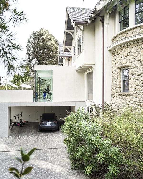 The exterior of Callahan’s home accentuates where the historical elements of the home meet the modern updates. Photography by Jon Day.
