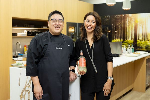 Chef Paul Tang and Cristina Allen or Volans tequila posing together.