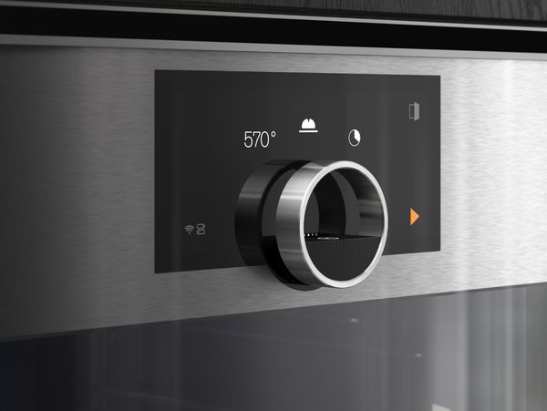 Close-up image of the Gaggenau Expressive series oven’s floating stainless steel control ring