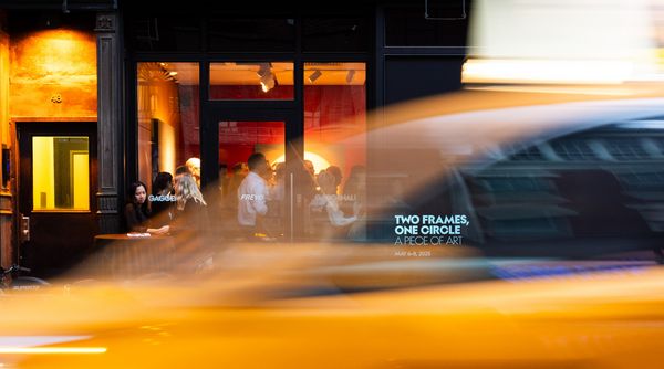 The exterior of Frevo, with a New York taxi speeding by in the foreground.