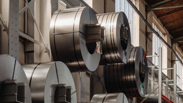 Large rolls of metal being stored on the wall of Gaggenau’s factory in Lipsheim