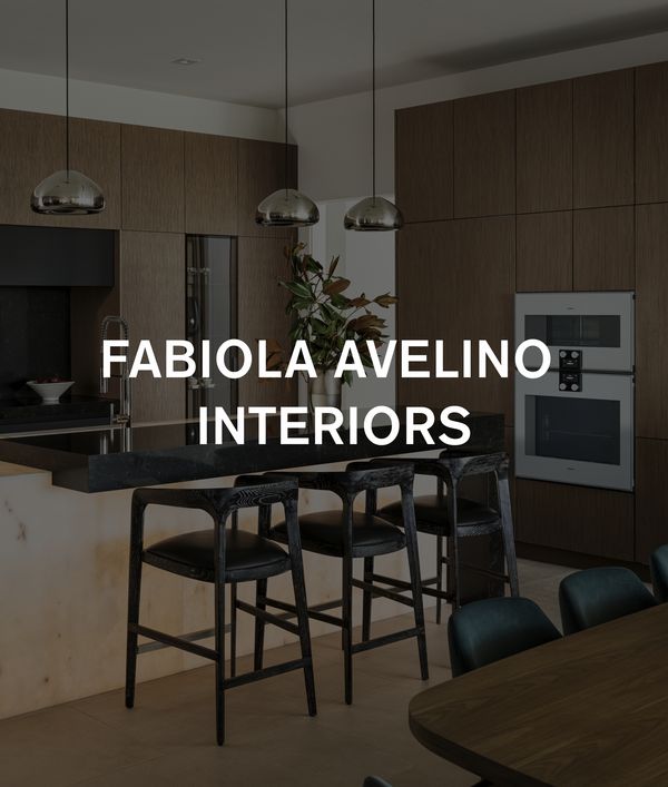 The kitchen space of Fabiola Avelino's project, lit by a glowing Cristallo quartzite island.