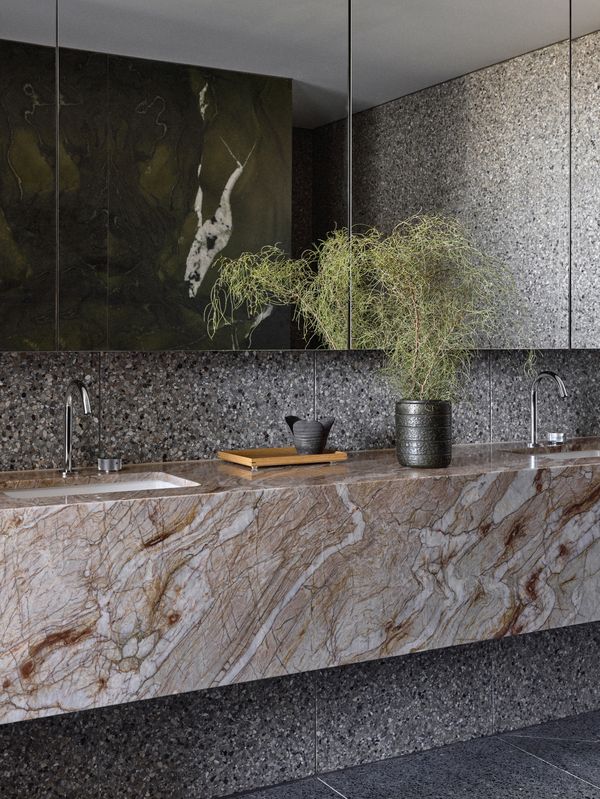 Bathroom details of an apartment in 131 Smith Street showing its refined marble finishes.