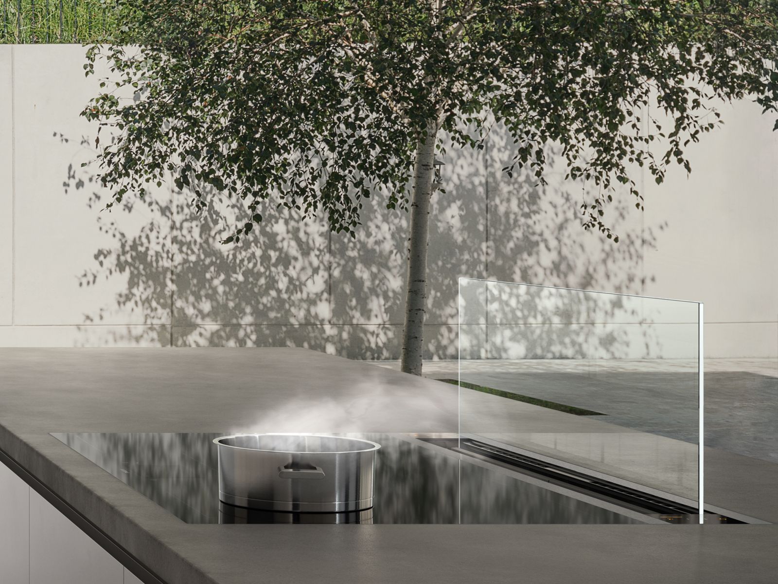 Gaggenau Tisch-Lüftung Serie 200 — flach und elegant in einer hellen Küchenumgebung