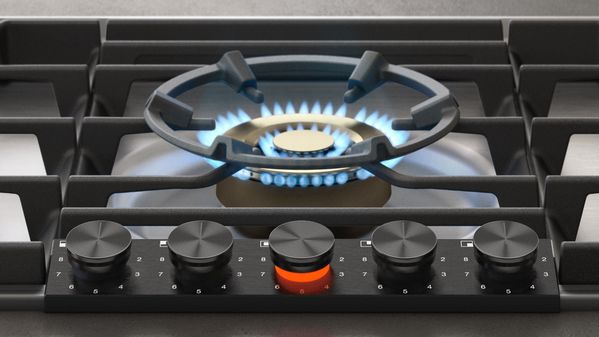 Gaggenau 200 series gas cooktop wok ring with burner lit