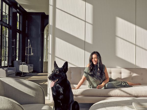 Windsor Smith and her dog relaxing in her home