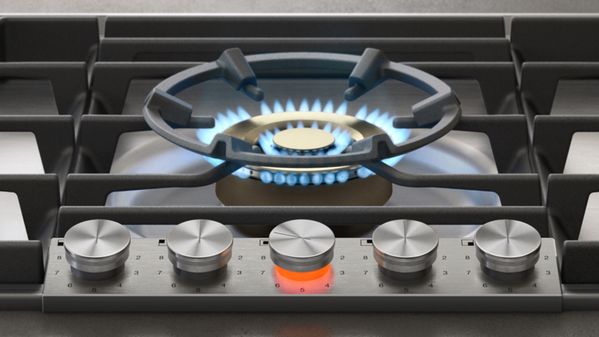 Gaggenau 200 series gas cooktop wok ring with burner lit