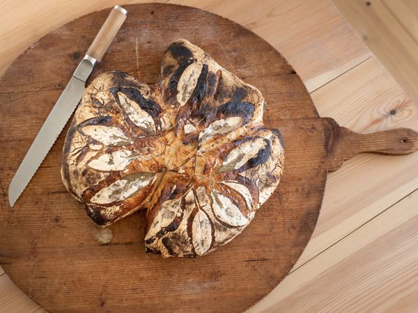 Fresh bread on a chopping board 