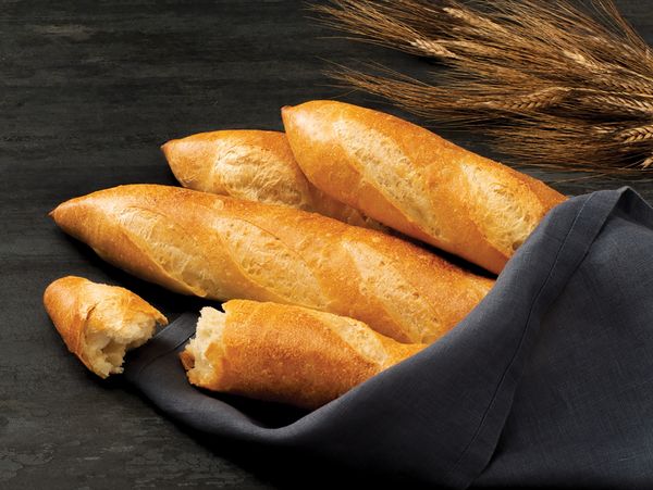 Image of french baguettes and heads of wheat