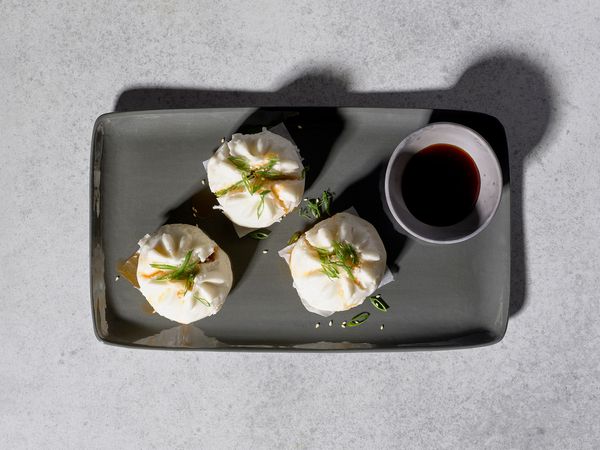 Chinese steamed pork buns on a plate