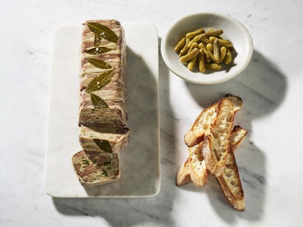 Pork and chicken terrine on a serving plate