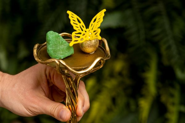 The "Yellow Butterfly" dish served in an ornamental golden cup. 