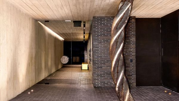 Elwood house’s Danish brick and timber entrance with twisted pilar design 