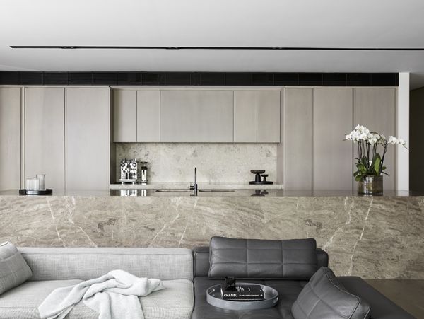 A large bright luxury kitchen with island worktop