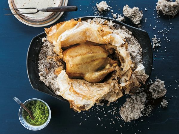 Hakka salt-baked chicken in a cooking bowl