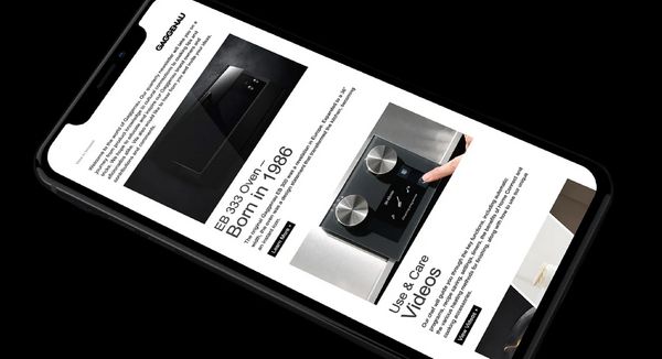 Close up of a Gaggenau newsletter on a mobile phone