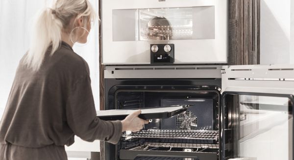 A Gaggenau owner using the 30” convection oven and 30” steam oven