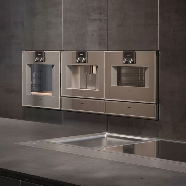 An image of a combination of Gaggenau ovens  in the setting of an art gallery