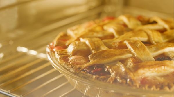 Lattice fruit pie cooking in a Gaggenau steam oven