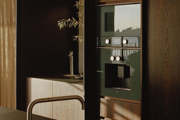 Close-up of the Gaggenau appliances blending into the luxury kitchen