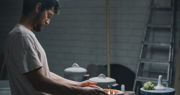 Xavier Mañosa, of Apparatu Ceramic Studio, diligently shaping a piece of clay. 