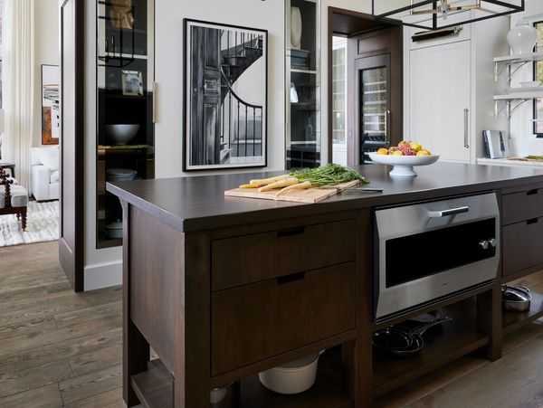 Lauren Tolles' lakehouse kitchen, with stunning dark wood complimenting the steel of her Gaggenau EB 333 oven. 