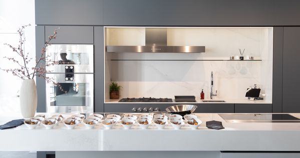 The Chicago showroom's bright interior, with plates arranged carefully on the counter for guests.