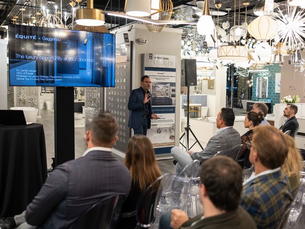 Dr. Langer presents to the crowd in Ferguson's lavish Chicago showroom.