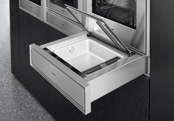 Close-up of an open Gaggenau Expressive series Vacuuming drawer