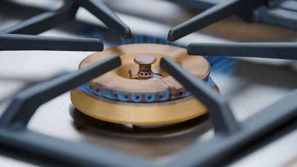 Close-up of the flame from one of the high output burners of a Gaggenau 5 Burner Vario Gas Cooktop 