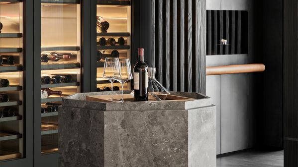 Guests are welcomed into the Miami showroom with tasteful wine pairings.