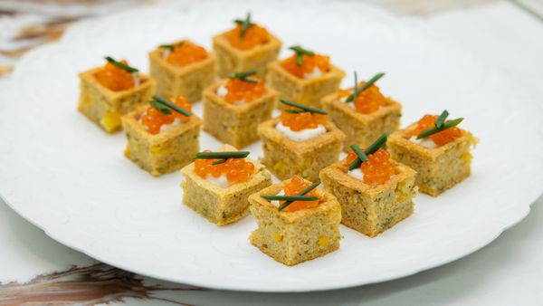 A close-up shot of Chef Paul Tang's savory corn waffle bites.