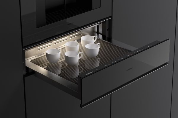 White espresso cups in the Gaggenau Minimalist series culinary warming drawer 