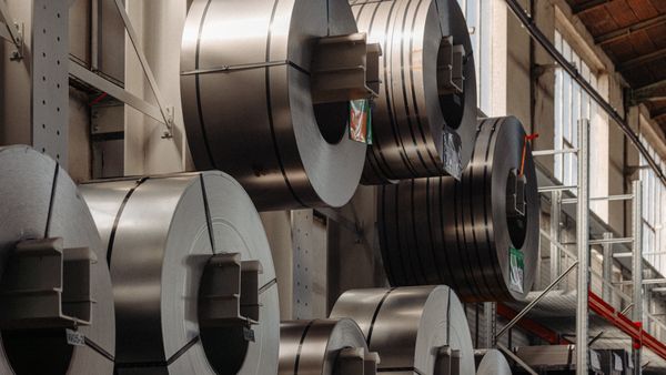 Large rolls of metal being stored on the wall of Gaggenau’s factory in Lipsheim