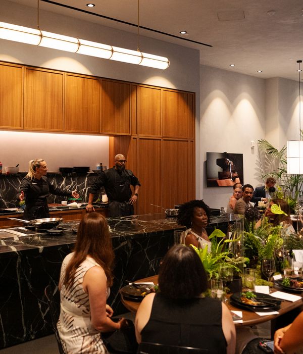 Chef Stella Giraldella and her staff address guests in the lavish interior of the Gaggenau DC showroom. 
