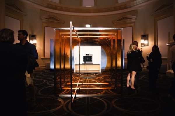 Gaggenau oven highlighted in an elegant setting with event attendees.