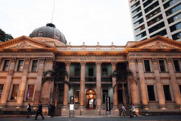Exterior view of Customs House building in the evening light.