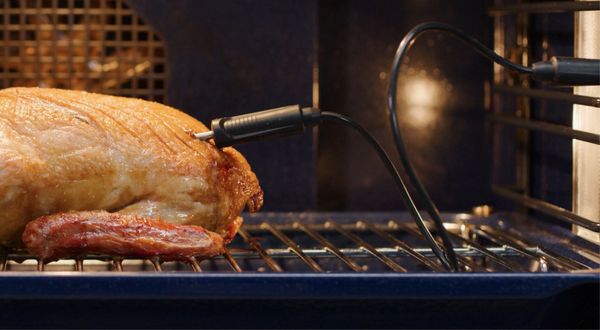 Gaggenau convection oven with a core temperature probe inserted into a turkey
