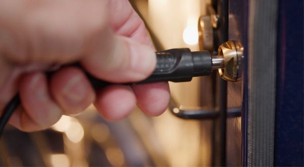 Plugging in a core temperature probe into a Gaggenau convection oven