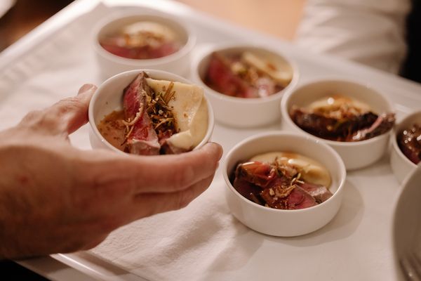 Small bowls of seared beef and purée at a Gaggenau event.