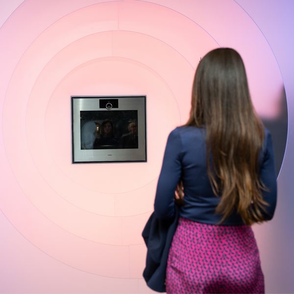 A visitor pausing to look at the Gaggenau Expressive Oven in the Believe. section of the Expressive dialogue exhibition