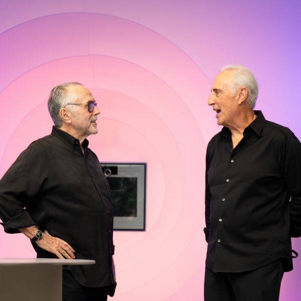 Visitors talking in front of the Gaggenau Expressive Oven in the Believe. section of the Expressive dialogue exhibition